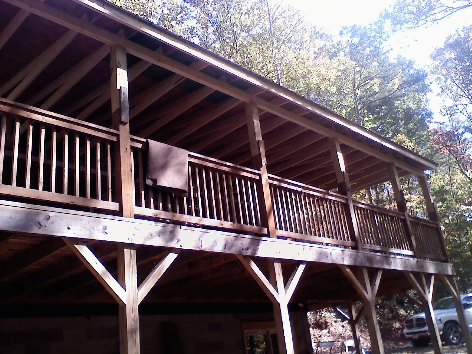 Timber framing under a new elevated porch and deck — Roof Leak Repair in Simms by Roofing Brothers